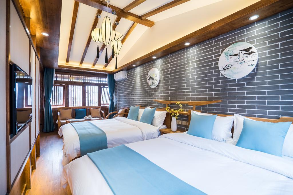 Lijiang Yue Tu Inn المظهر الخارجي الصورة