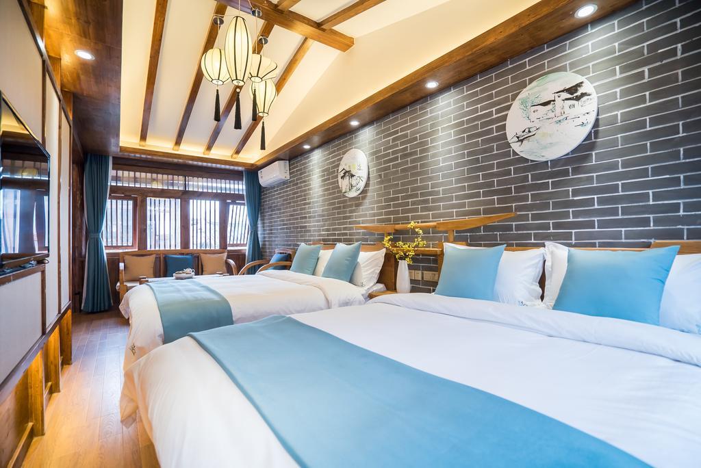 Lijiang Yue Tu Inn المظهر الخارجي الصورة